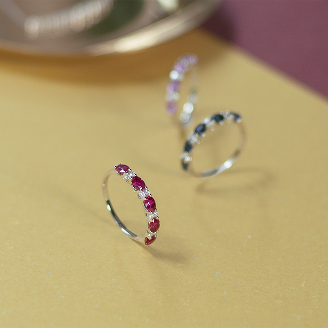 Oval ruby diamond band